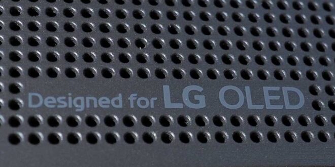 lower left corner of the top plate of LG SC9S soundbar